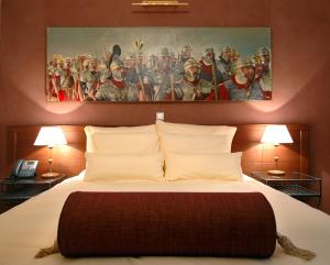 Llit o llits en una habitació de Hotel Mitra, Story Hotels
