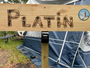 a sign with the word farm on top of a tent at Your Camp Hel in Hel