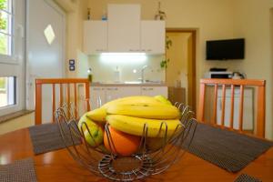 Kuchyň nebo kuchyňský kout v ubytování Uliveto Apartment