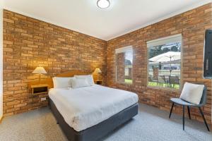 Säng eller sängar i ett rum på BIG4 Tasman Holiday Parks - Warrnambool