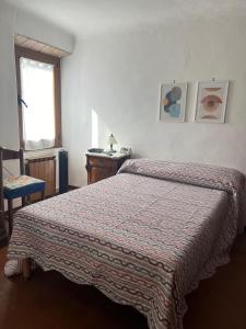 Postel nebo postele na pokoji v ubytování Chez Fernando Lerici front beach free parking