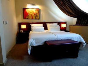 Llit o llits en una habitació de Hotel Mitra, Story Hotels