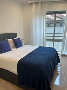 Postel nebo postele na pokoji v ubytování REGIDOR Cartagena