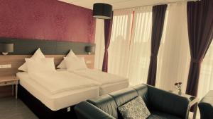 Ένα ή περισσότερα κρεβάτια σε δωμάτιο στο Hotel Efcannos +17 φωτογραφίες