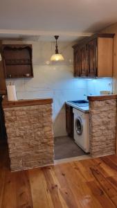 Kuchyň nebo kuchyňský kout v ubytování Charme studio