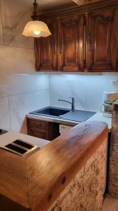 Kuchyň nebo kuchyňský kout v ubytování Charme studio