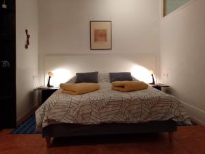 Postel nebo postele na pokoji v ubytování Apartments JUGO i BURA