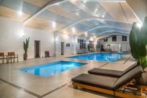 a large swimming pool with a large ceiling at BIG4 Tasman Holiday Parks - Warrnambool in Warrnambool