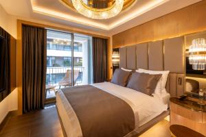 Postel nebo postele na pokoji v ubytování Merit Starlit Hotel & Residences