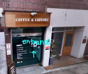 an entrance to a coffee and liquors store at Mong House #Mangwon-dong Mangridangil 2F Private stay in Seoul