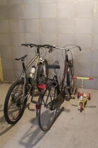 two bikes are parked next to a wall at Dimora de' Canulei in Bolsena