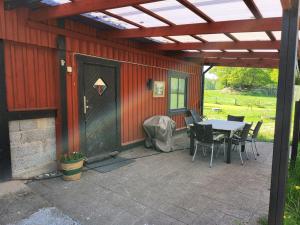 Patio nebo venkovní prostory v ubytování Stuga på landet