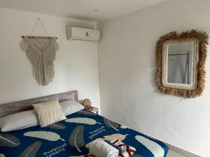 Postel nebo postele na pokoji v ubytování Surf Bali Villa