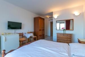 Postel nebo postele na pokoji v ubytování Adria Brela Apartments