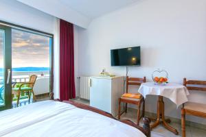 TV a/nebo společenská místnost v ubytování Adria Brela Apartments