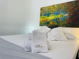 Postel nebo postele na pokoji v ubytování Apartamento Jimena Maro en el centro de Nerja