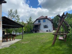 Zahrada ubytování Riverside Stay at Stary Rynek - billiards, foosball and arcade games