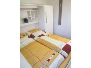 Ένα ή περισσότερα κρεβάτια σε δωμάτιο στο Holiday home for 4 people in Cuxhaven