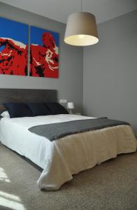 מיטה או מיטות בחדר ב-La Casa Verde - Ruzafa