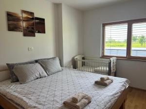 Postel nebo postele na pokoji v ubytování Capo House