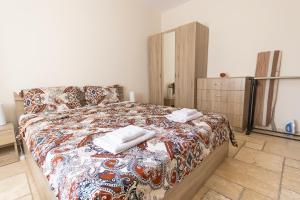 En eller flere senge i et værelse på Omnia in Kaliakria Resort by RV Apartments + 63 billeder