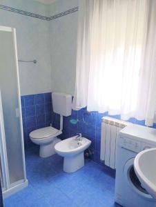 Koupelna v ubytování Apartments in Rosolina Mare 24930