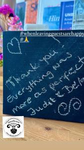 a handwritten handwritten message on a black board at Guesthouse Sabine - pr` Skminc in Bohinjska Bela