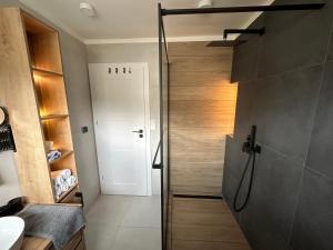 Koupelna v ubytování Apartmán Oriens Pec pod Sněžkou + 17 fotografií