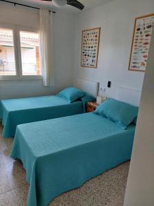 Postel nebo postele na pokoji v ubytování LV REAL ESTATE Cye II