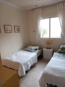 Postel nebo postele na pokoji v ubytování Ferienwohnung in Orihuela Costa - 3 Zimmer