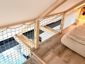 Apartmán Bellaにあるベッド