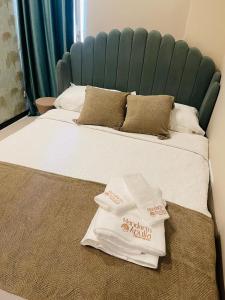 Postel nebo postele na pokoji v ubytování Mandarin Apulia 19 B&B