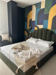 Postel nebo postele na pokoji v ubytování Mandarin Apulia 19 B&B