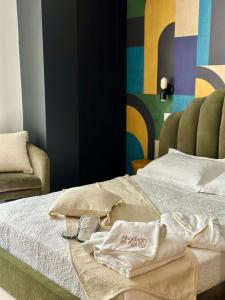 Postel nebo postele na pokoji v ubytování Mandarin Apulia 19 B&B