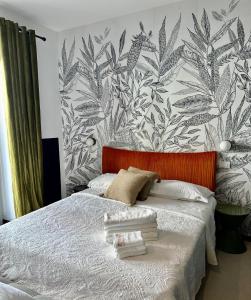 Postel nebo postele na pokoji v ubytování Mandarin Apulia 19 B&B