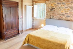 Letto o letti in una camera di Podere del Pari