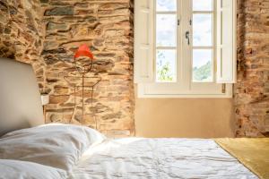 Letto o letti in una camera di Podere del Pari