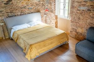 Letto o letti in una camera di Podere del Pari