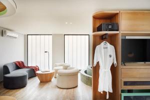 TV a/nebo společenská místnost v ubytování Wellcomm Spa & Hotel