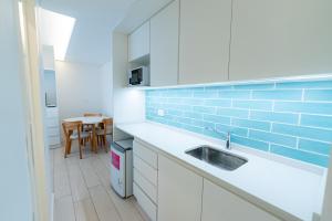 Kuchyň nebo kuchyňský kout v ubytování Hotel Nova + 31 fotografií