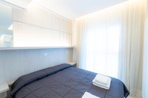 Postel nebo postele na pokoji v ubytování Hotel Nova