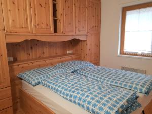A bed or beds in a room at Haus Renata by Globalimmoservice