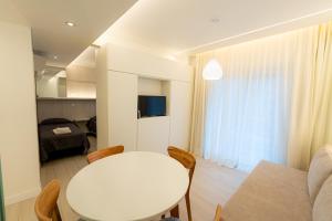 TV a/nebo společenská místnost v ubytování Hotel Nova