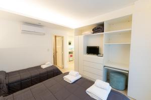 TV a/nebo společenská místnost v ubytování Hotel Nova
