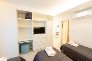 Postel nebo postele na pokoji v ubytování Hotel Nova