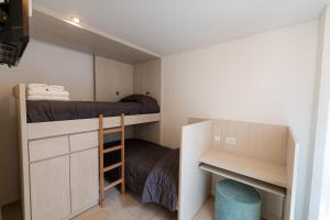 Postel nebo postele na pokoji v ubytování Hotel Nova