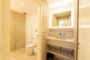 Koupelna v ubytování Hotel Nova