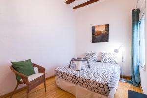 En eller flere senge i et værelse på Old Town Plaza Negrito by Nomad Host