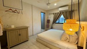 Postel nebo postele na pokoji v ubytování Hotel Noah Tulum