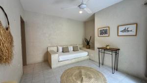 Postel nebo postele na pokoji v ubytování Hotel Noah Tulum